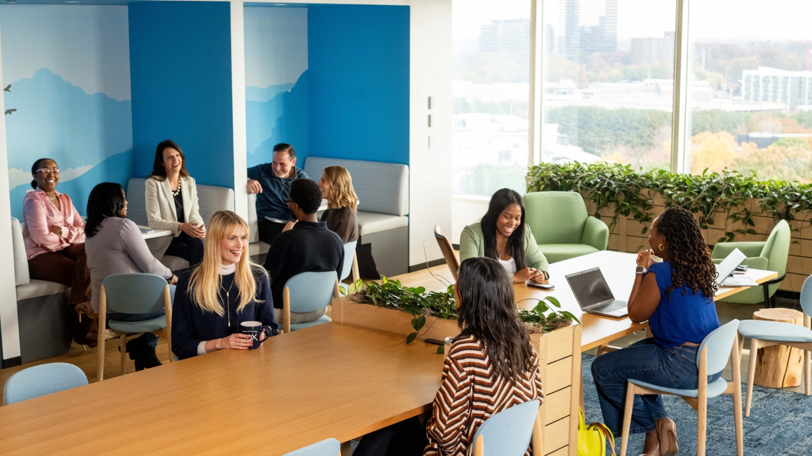 a group of people sitting around a table