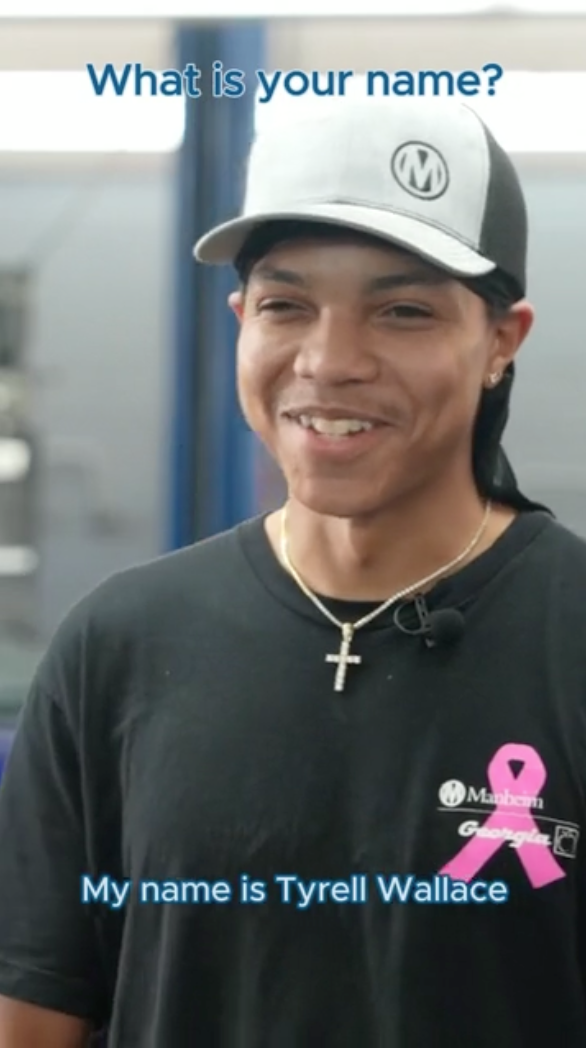 a person wearing a hat and a black shirt