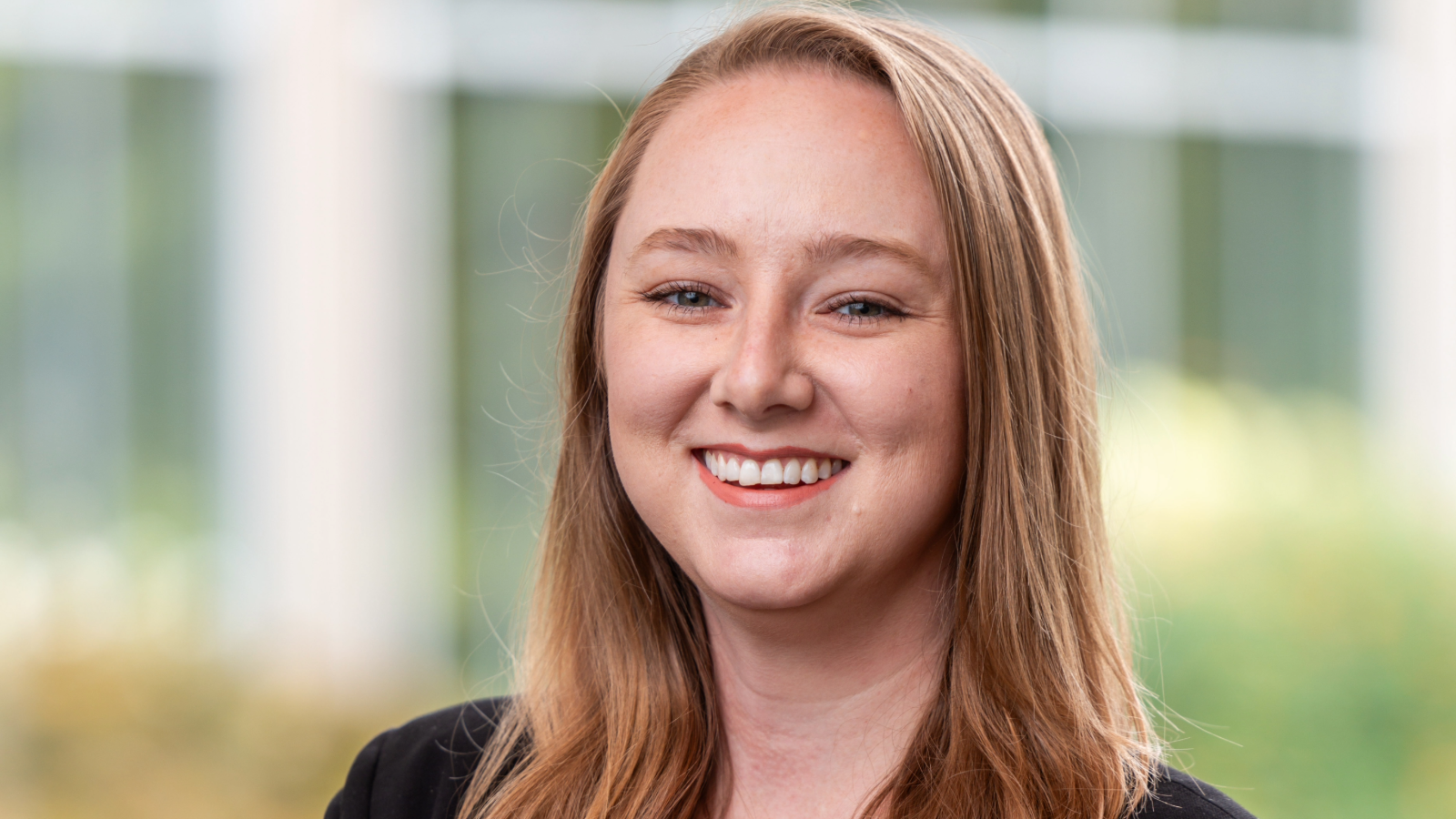 a person smiling at camera