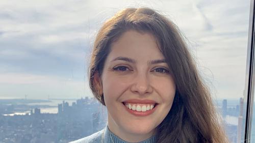 a person smiling at the camera