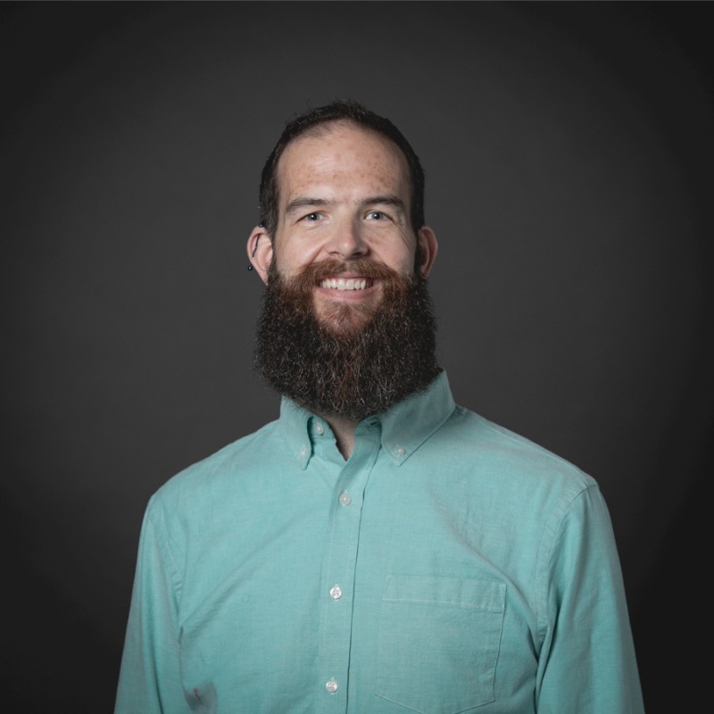 Cox employee smiling at camera