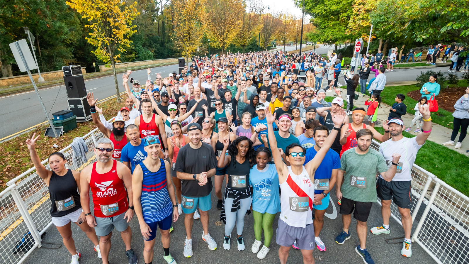 a group of people standing on a street