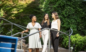 a group of Cox employees standing on stairs