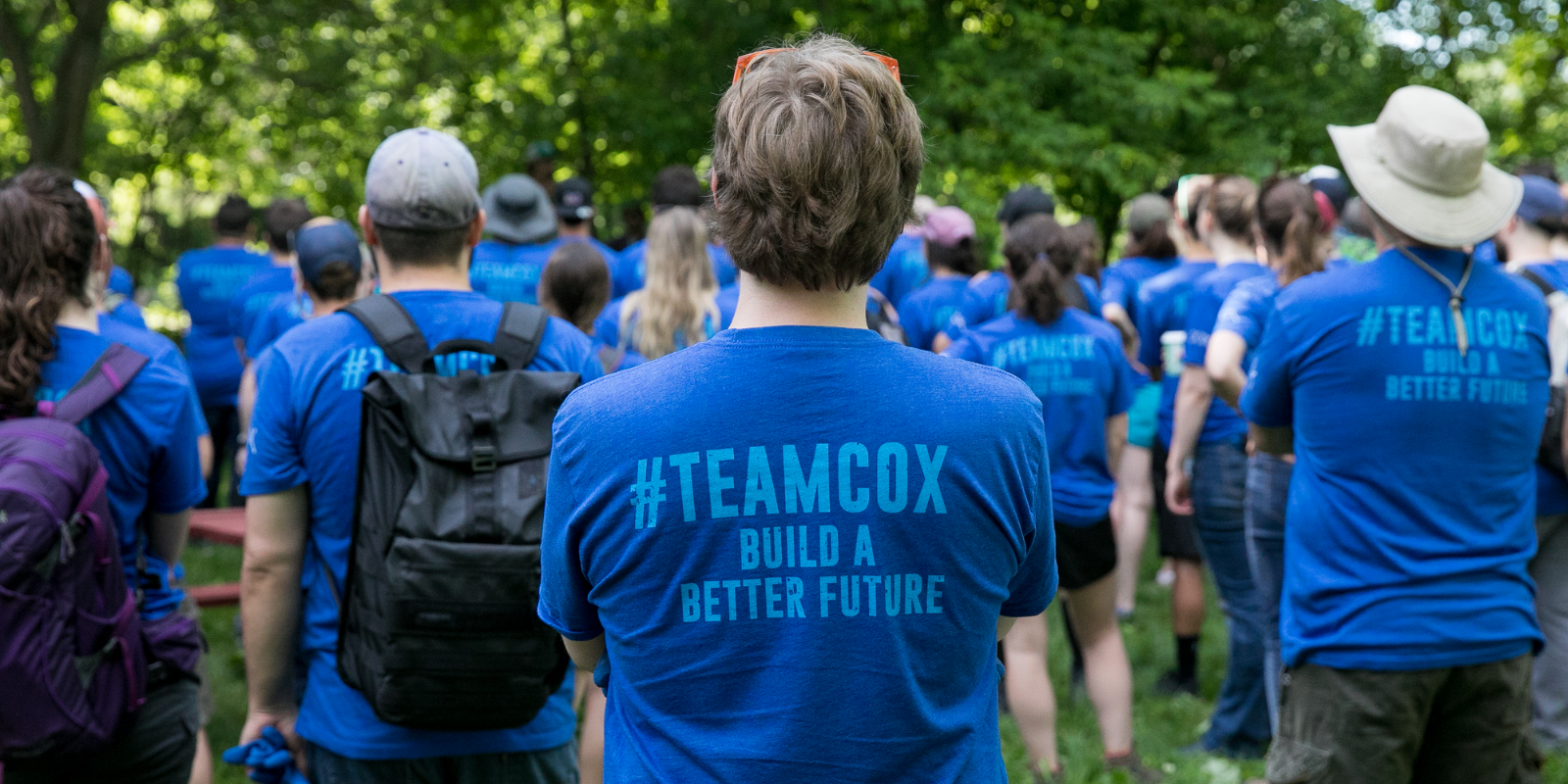 Cox employees volunteering outdoors