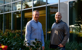 Cox Automotive employees standing in front of the office building