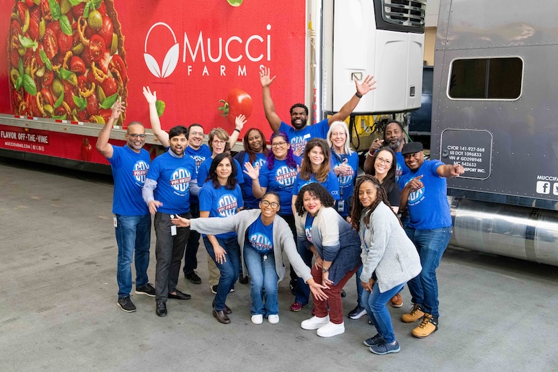 a group of people posing for a photo