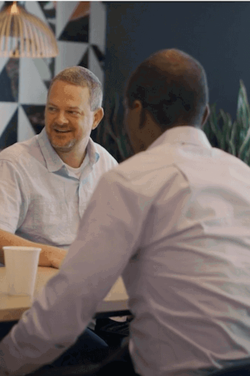 RapidScale employees collaborating around a table