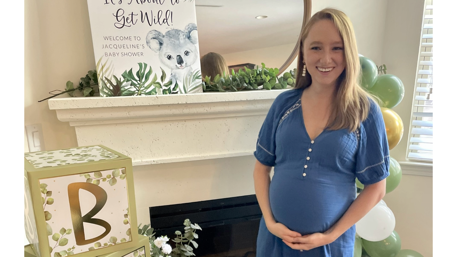 a cox employee smiling at a baby shower