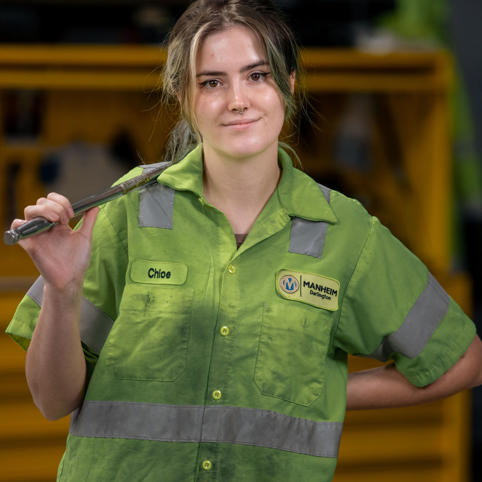 Cox automotive woman technician with a tool