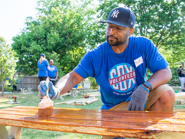 Cox volunteer painting