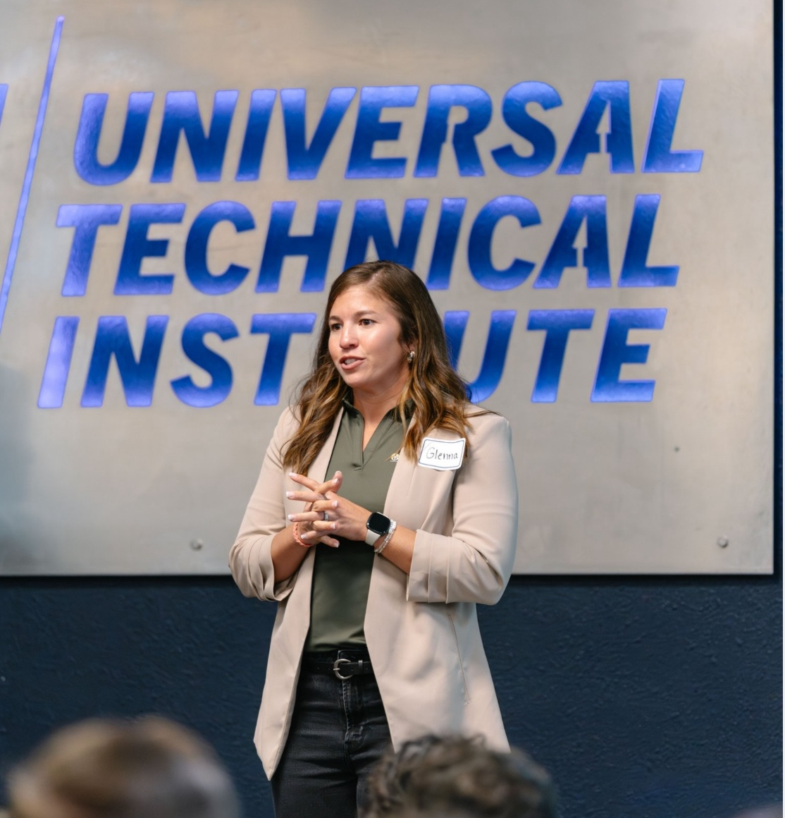 a person standing in front of a sign