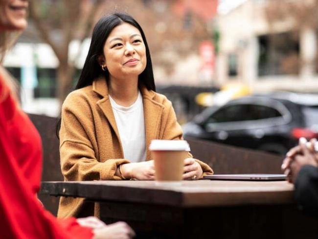 Cox enterprises employee Amy Lin drinking coffee