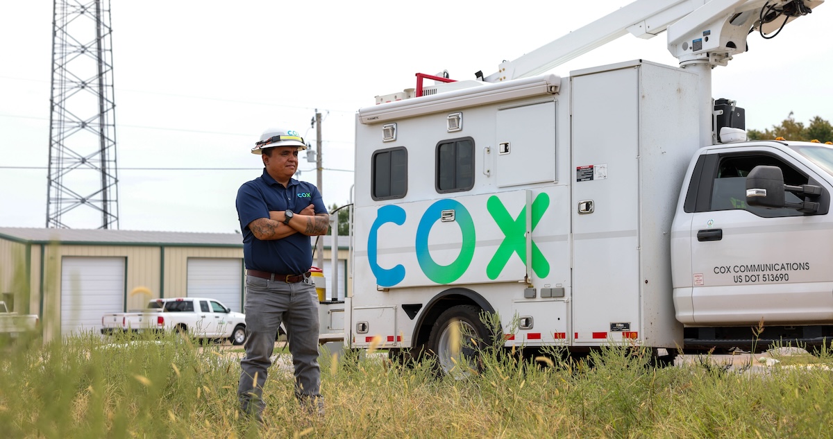 a person standing in front of a truck