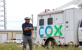 a person standing in front of a truck