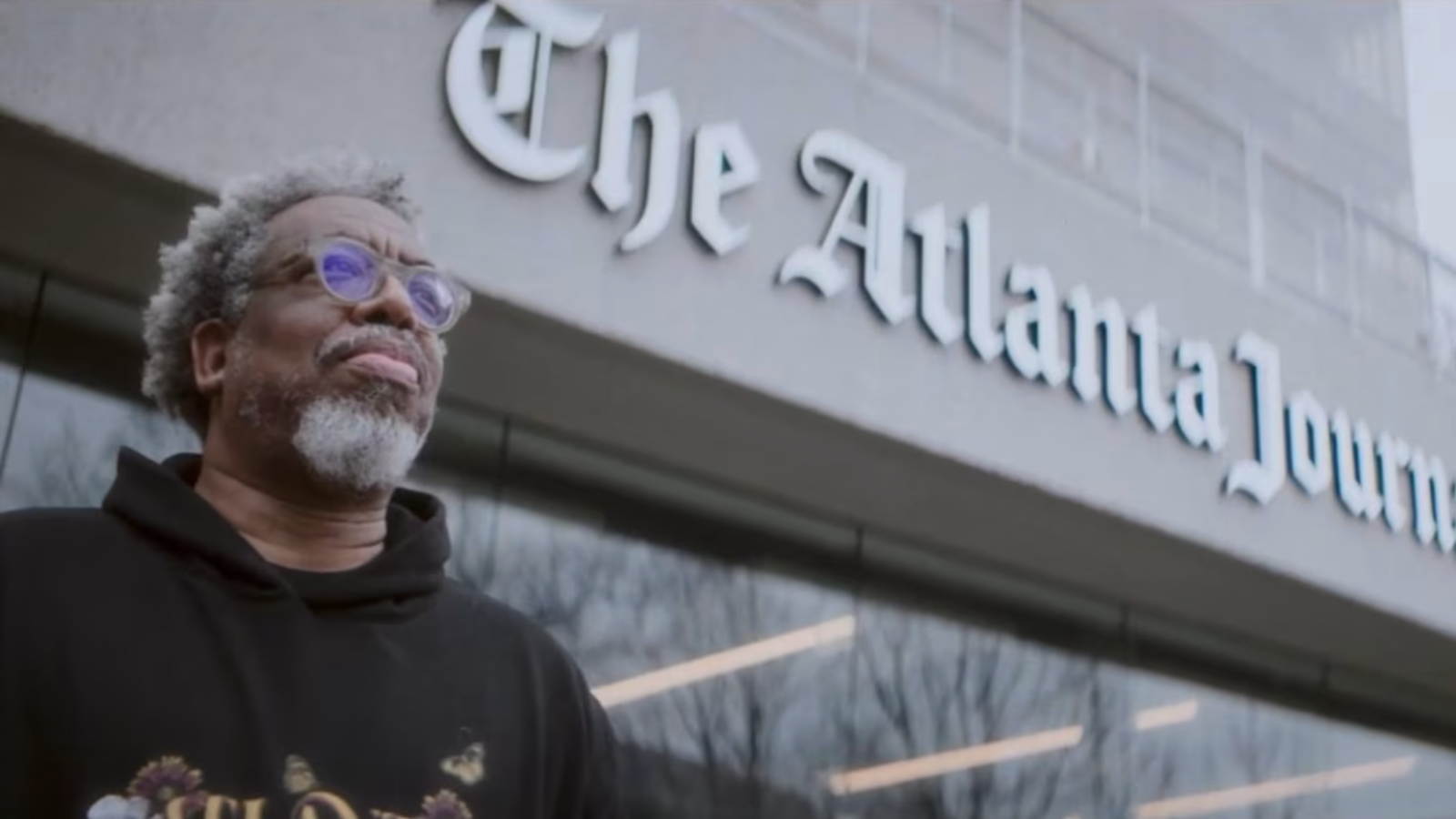 a person in front of a building