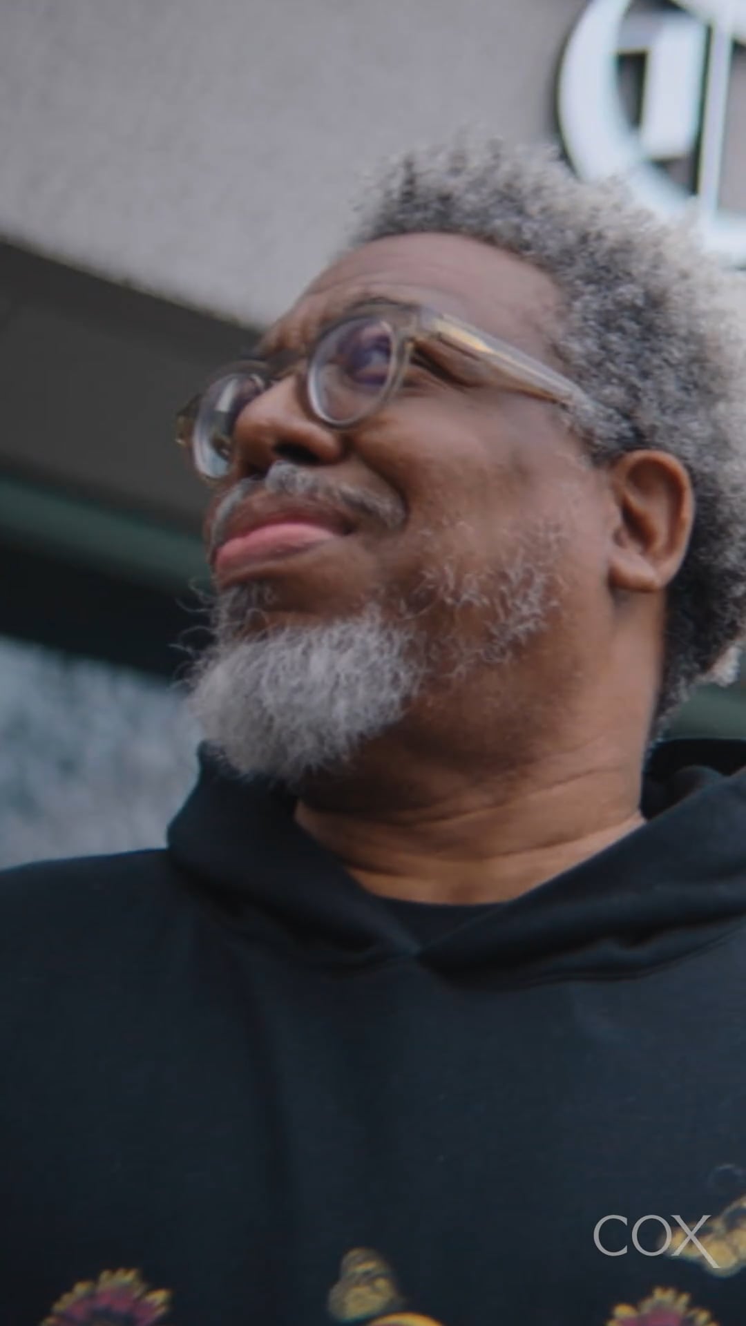 a person with glasses and a beard