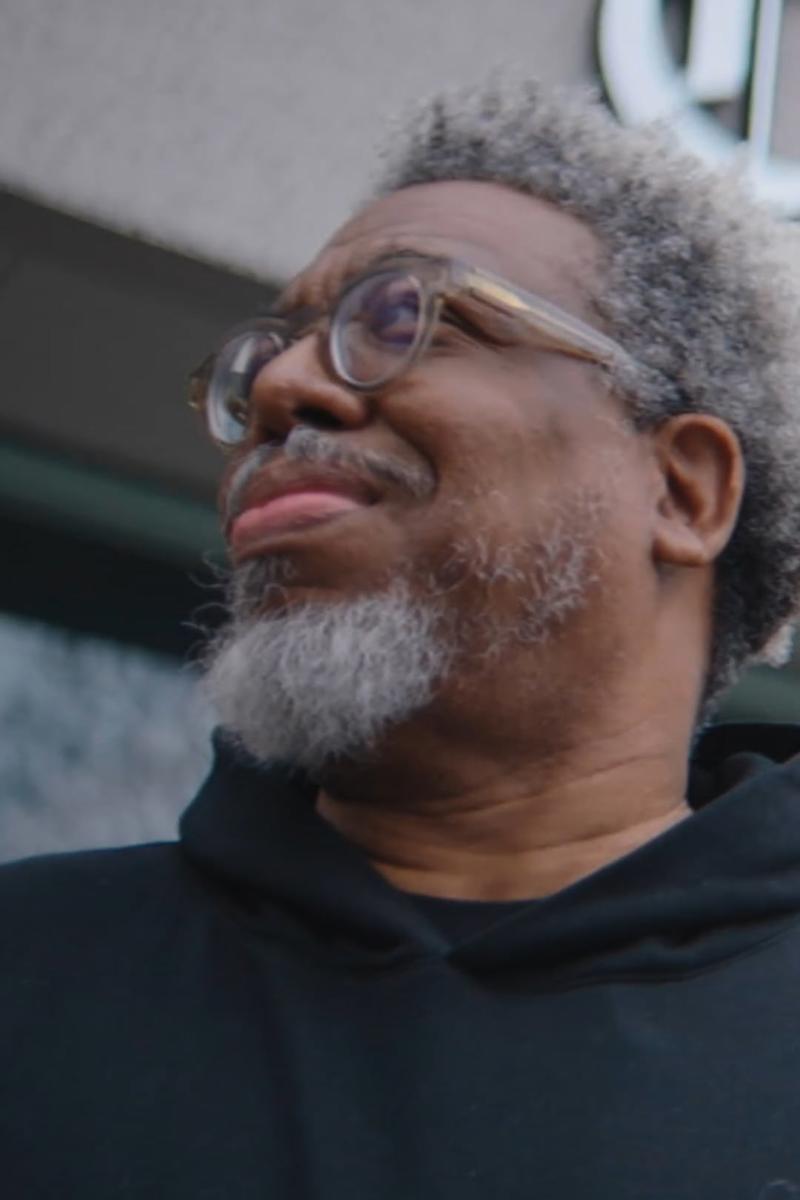 a person with glasses and a beard