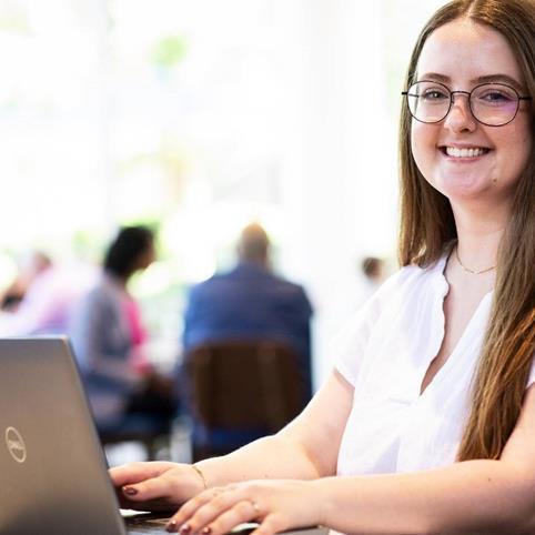 Cox employee in the cafe