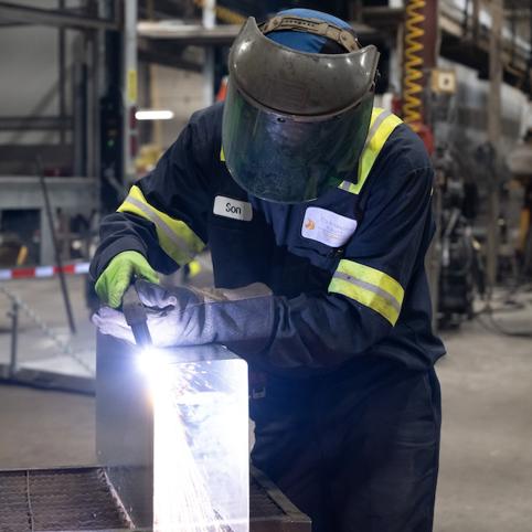 Cox Employee Welding