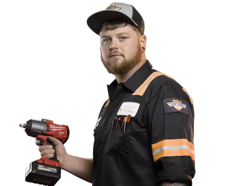 cox employee holding a drill