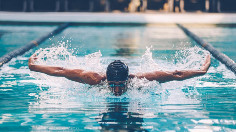 a person swimming in a pool