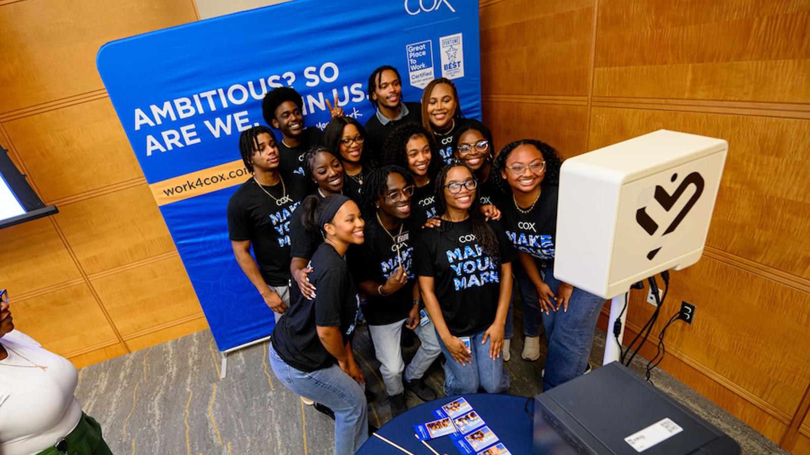 a group of people posing for a photo