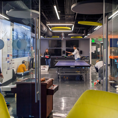 Cox employees playing ping pong