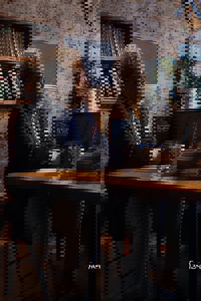 a person sitting at a table