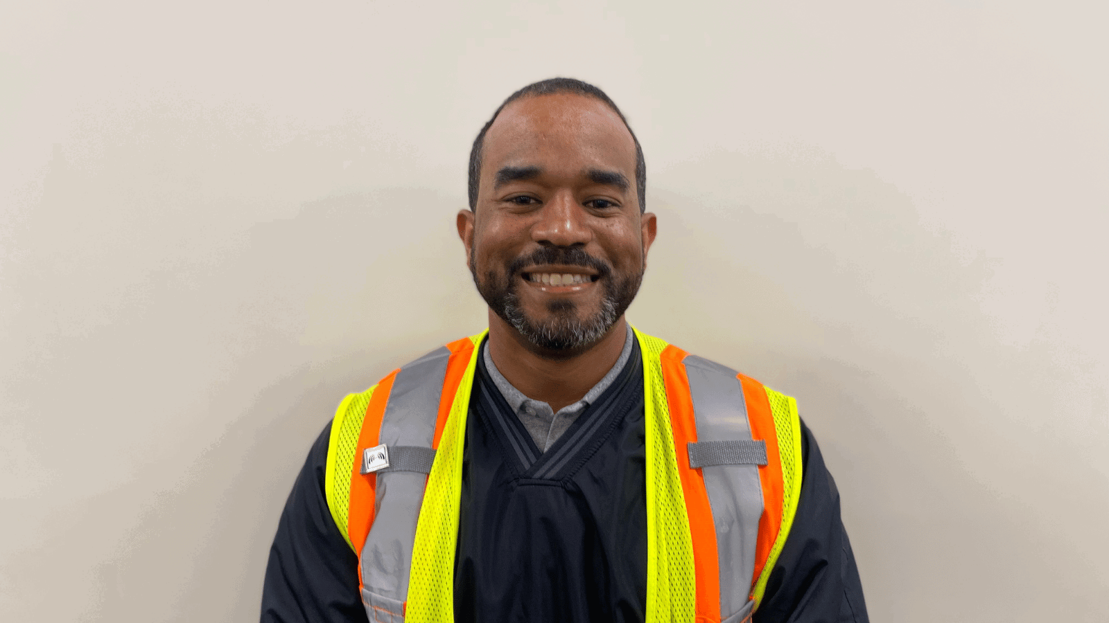 Cox employee smiling at camera