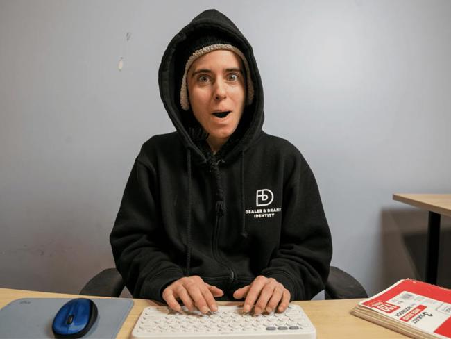 Cox Technology employee working on a computer