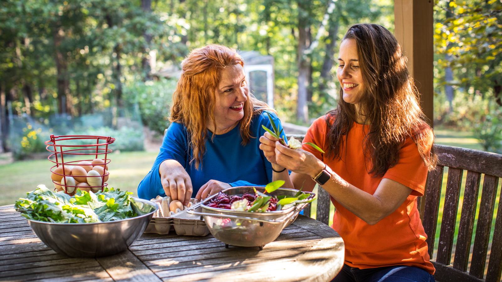 Cox employees preparing a salad
