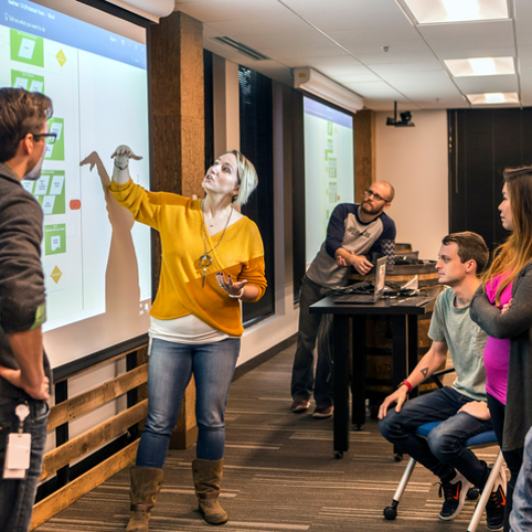 Cox employees giving a presentation