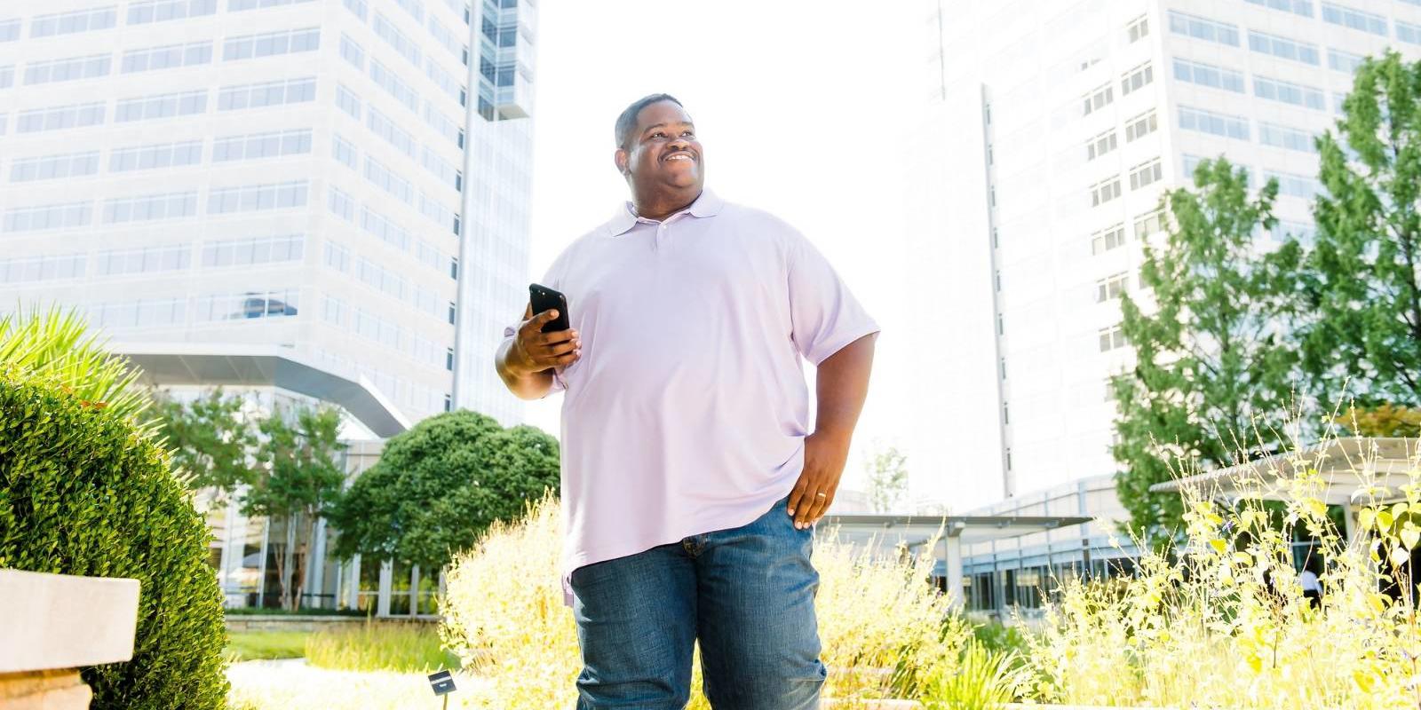 Huiet Joseph Cox employee outside Cox headquarters