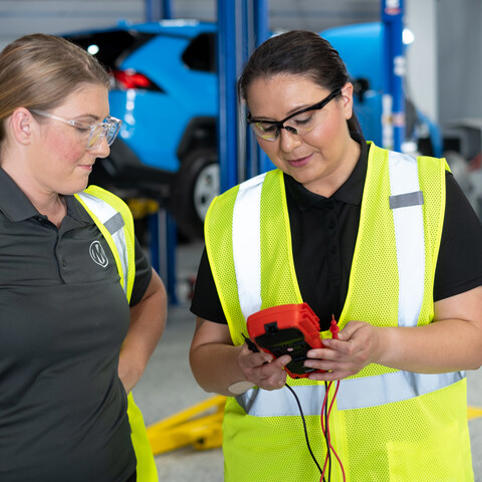 Cox automotive woman technicians working together