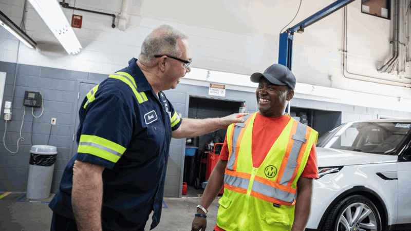Two Cox Manheim Mechanics