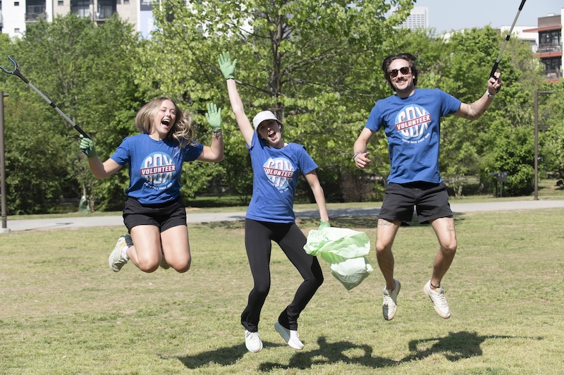 a group of people jumping in the air