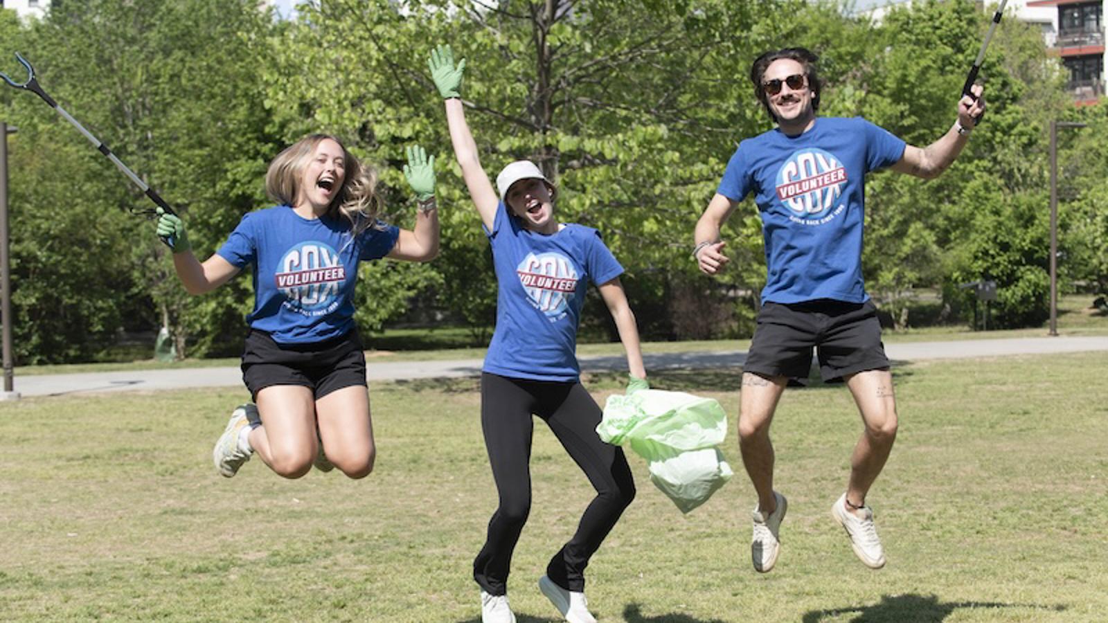 a group of people jumping in the air
