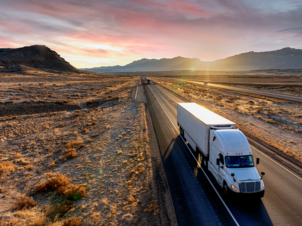 Truck driving through the desert