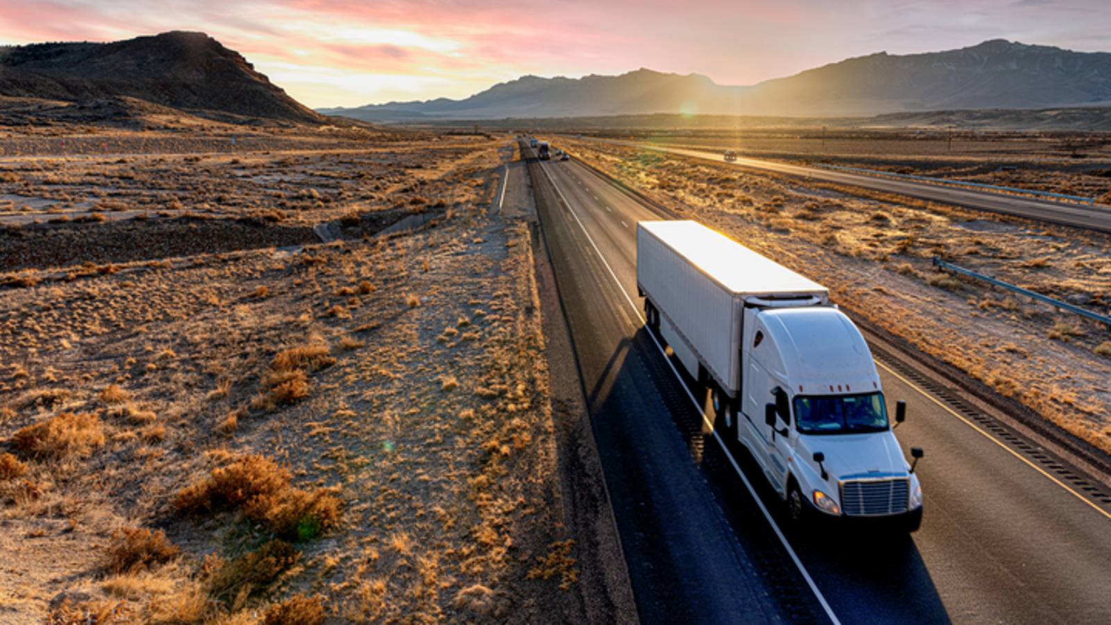 Truck driving through the desert