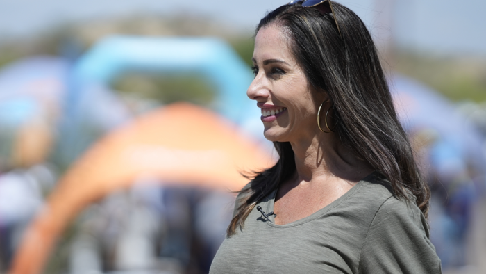 a close-up of a Manheim general manager smiling