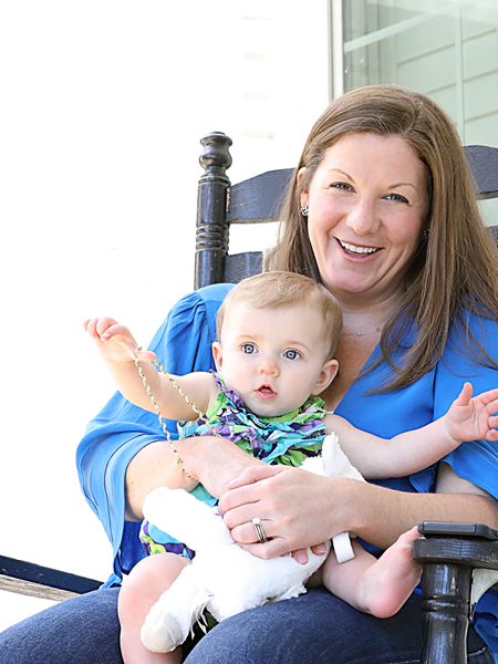 Cox employee with baby