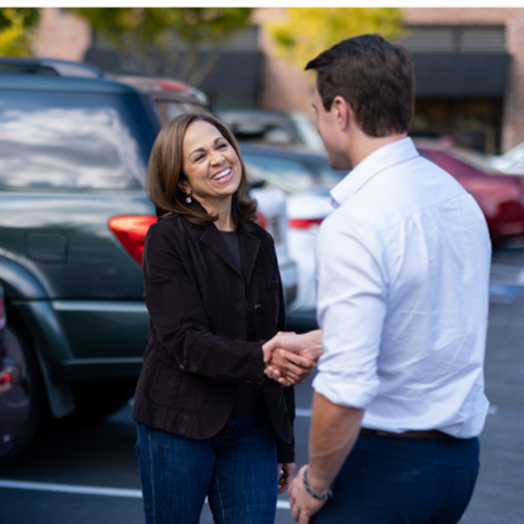 Cox employees shaking hands