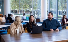 3 Cox Employees Collaborating