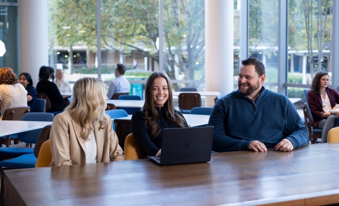 3 Cox Employees Collaborating
