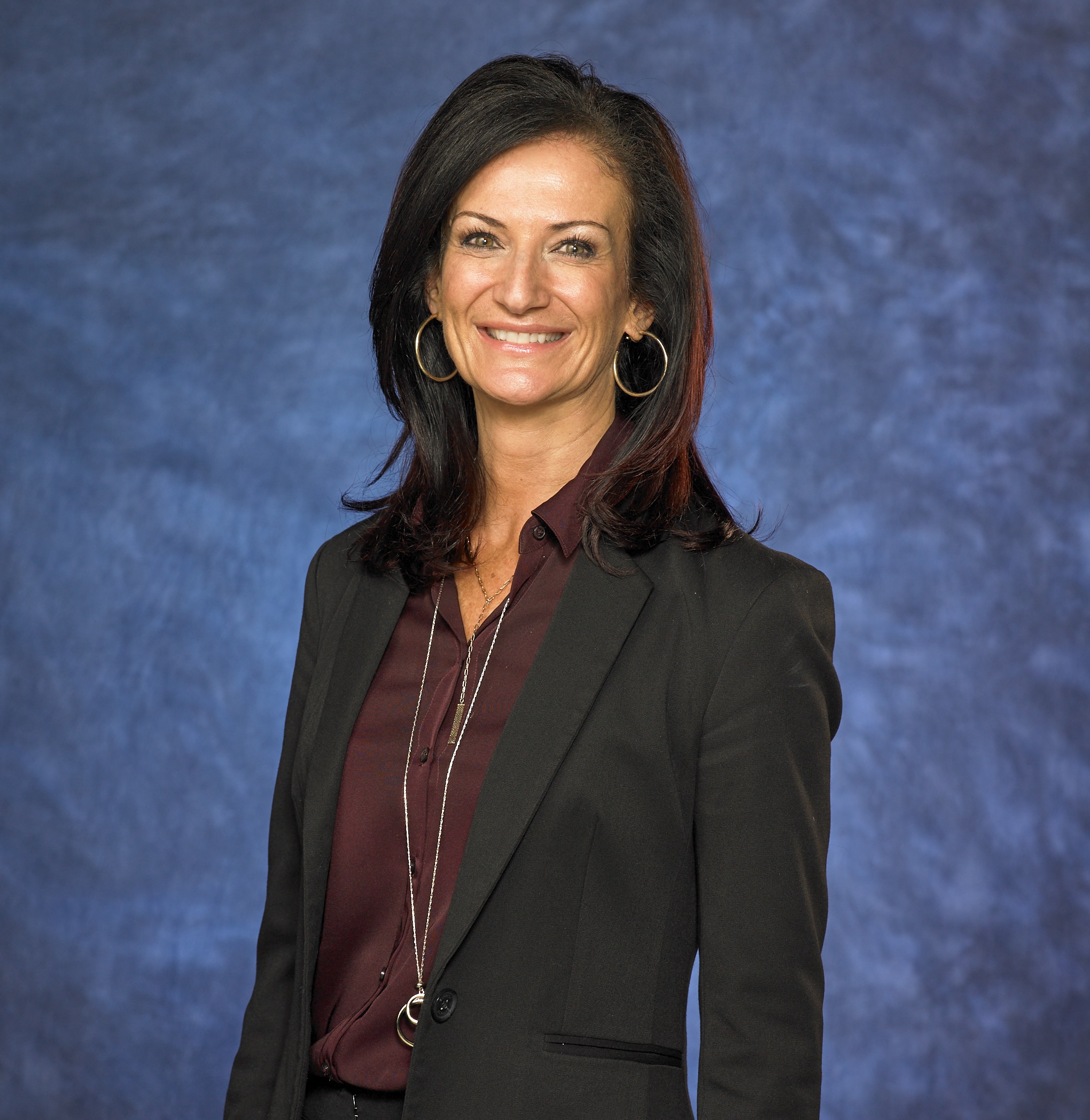 a Cox employee in a suit