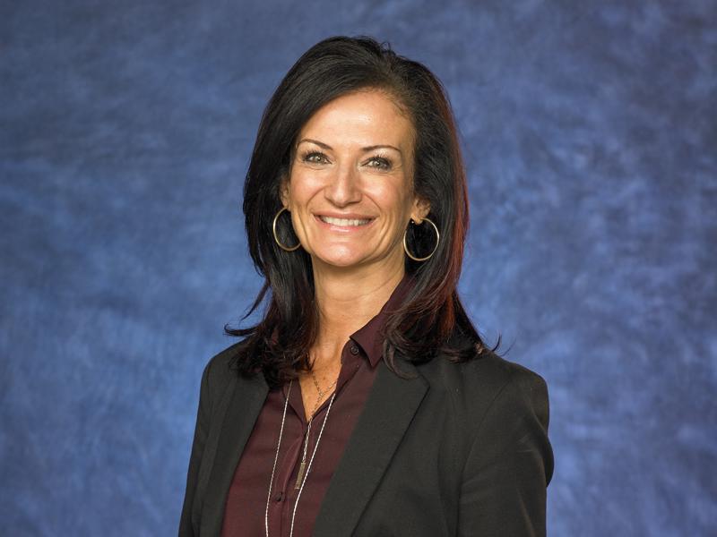 a Cox employee in a suit