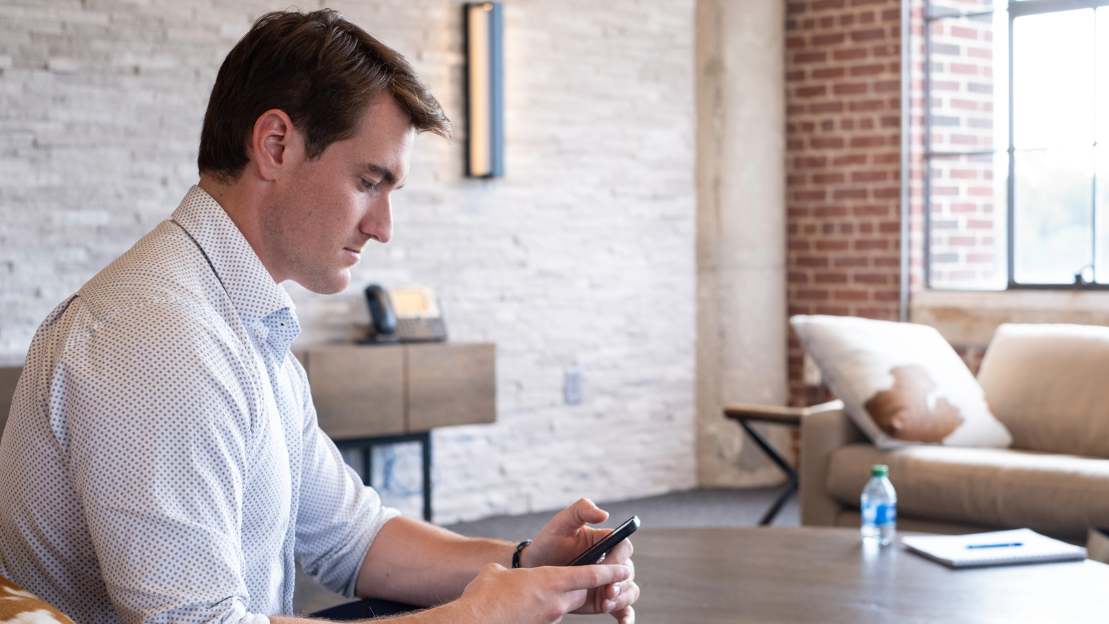 a person looking at his phone