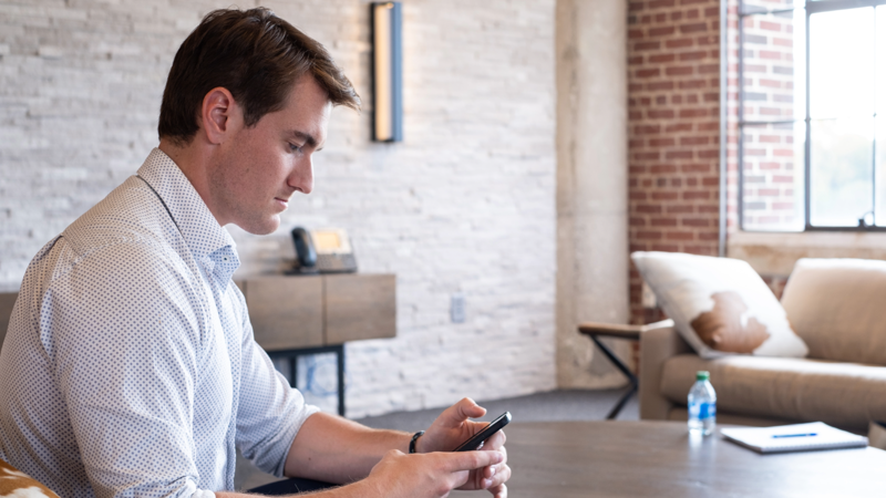 a person looking at his phone