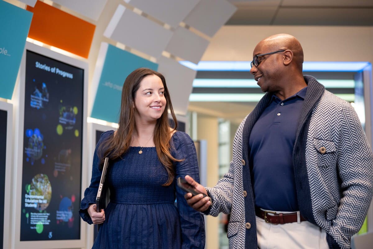 a person and person holding a phone