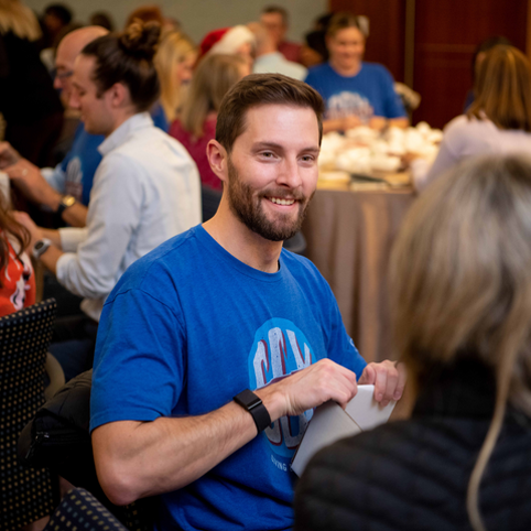 Cox employee volunteering for united way